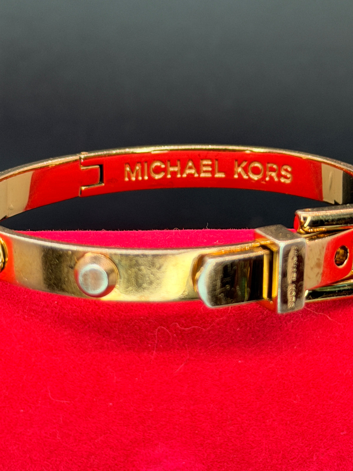 Michael Kors Gold Tone Astor Studded Buckle Hinged Bangle Bracelet